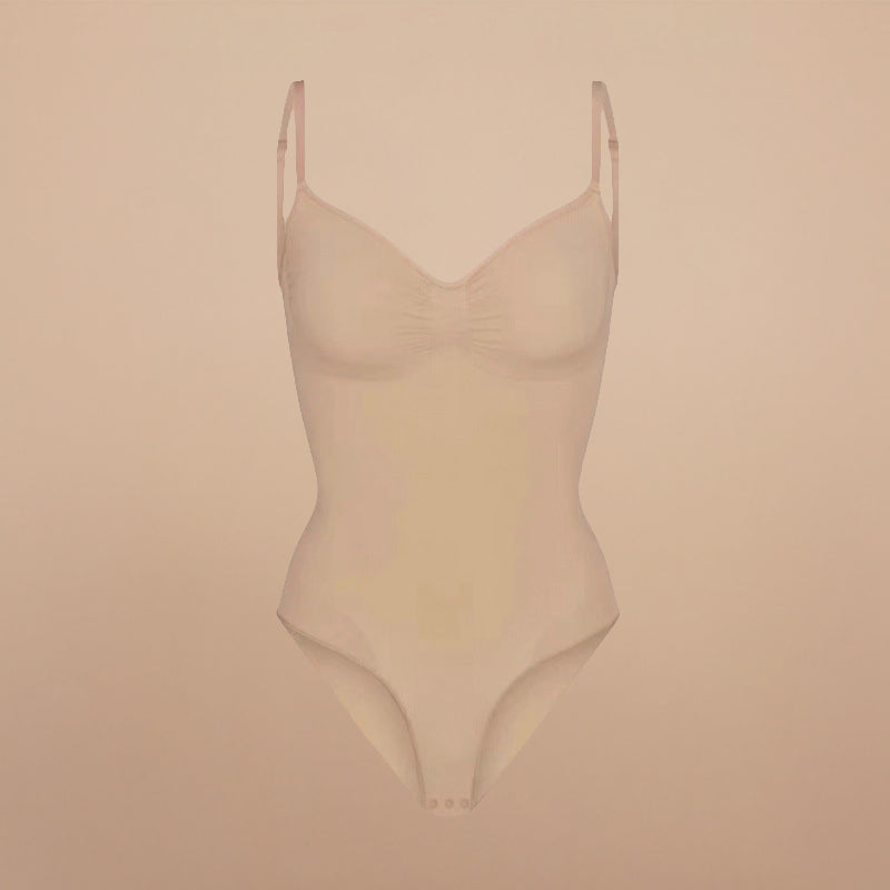 NovaShape Comfort Contour Bodysuit in beige, vrijstaand productbeeld met geïntegreerde slip en gladde afwerking.